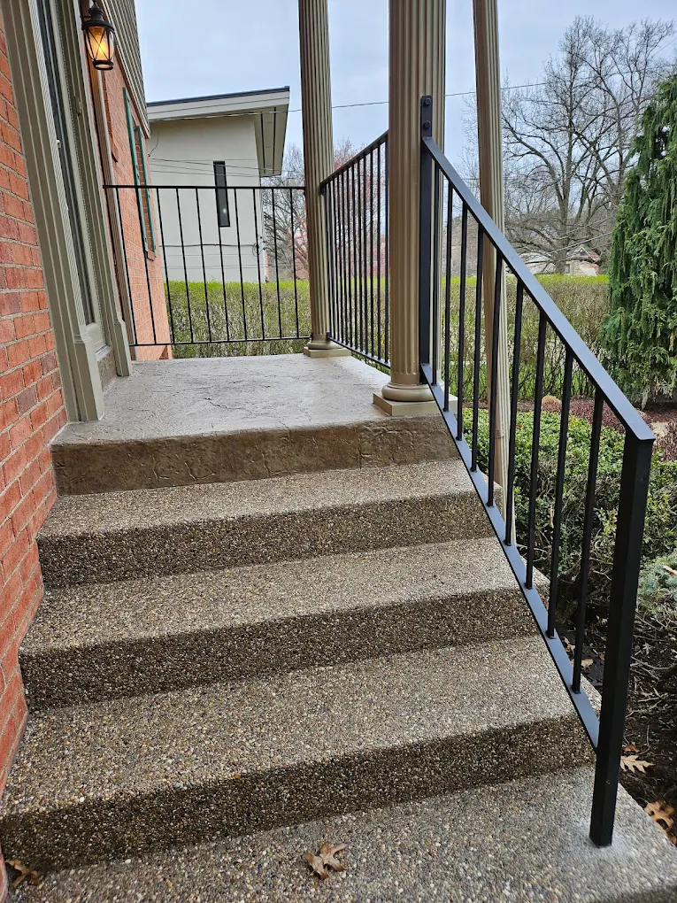 Residential porch railing with vertical balusters