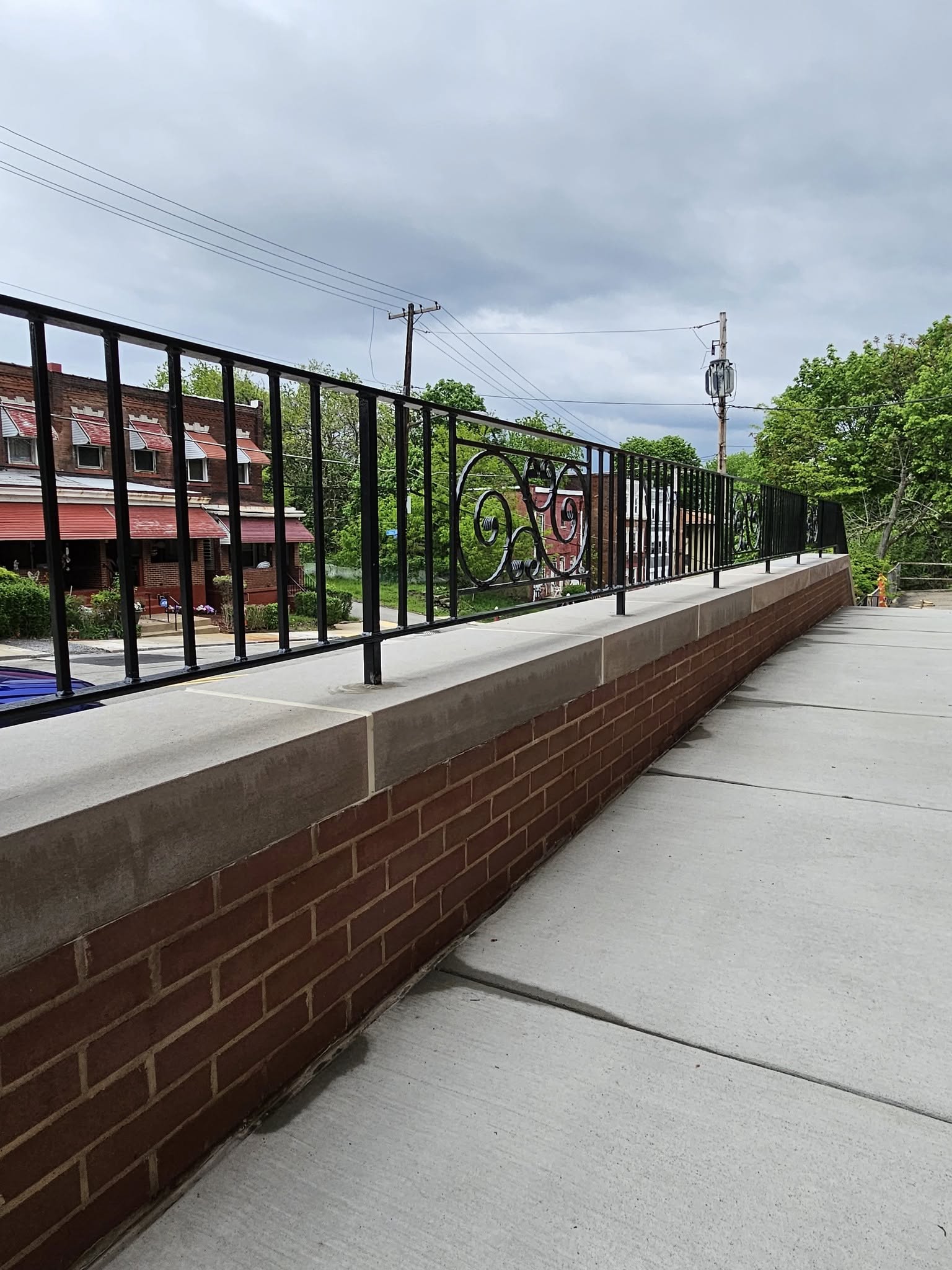 Ornamental scrollwork railing on commercial building